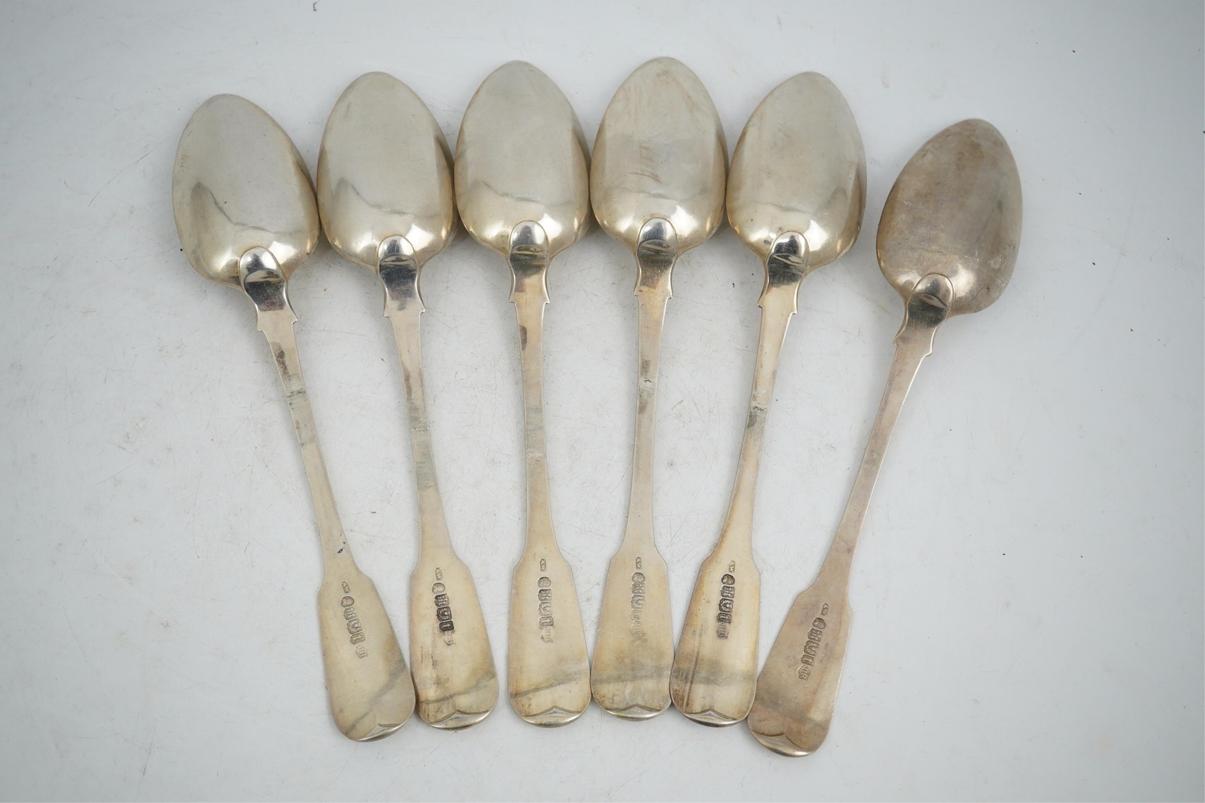 A set of six George IV Scottish silver fiddle pattern table spoons, Andrew Wilkie, Edinburgh, 1825, 13.2oz.